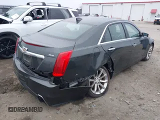 2018 Cadillac CTS Luxury AWD z VIN 1G6AX5SS6J0111510, wystawiony jako IAAI lot #41501384 z przebiegiem 68 315 mil mil oraz . Historia ofert i sprzedaży dostępna na DreamBid. Obrazek 4.