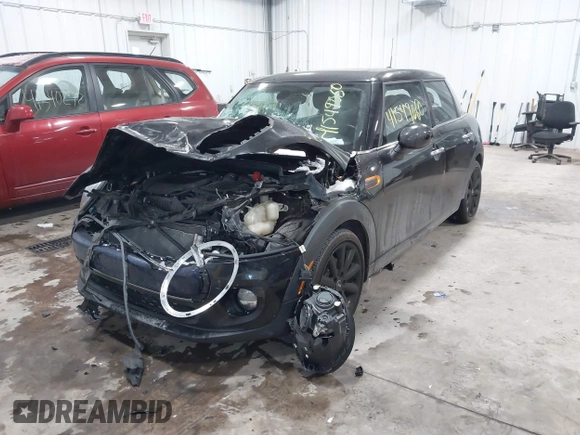 2017 MINI Hardtop 4 Door Cooper with VIN WMWXU1C34H2F78228, listed as a IAAI auction lot 41549060 with 49,393 mi miles. Bid and sale history available at carsss.com. Image 2.