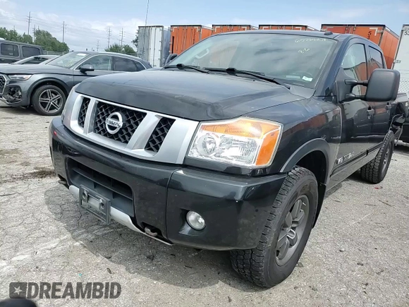 2015 Nissan Titan Pro-4X with VIN 1N6BA0EC1FN507894, listed as a Copart auction lot 65784274 with 147,576 mi miles and Salvage title. Bid and sale history available at DreamBid. Image 10.