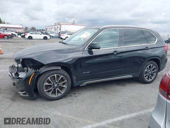 2018 BMW X5 xDrive35i with VIN 5UXKR0C55JL073210, listed as a IAAI auction lot 42047558 with 37,497 mi miles. Bid and sale history available at carsss.com. Image 15.