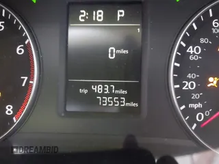 2015 Volkswagen Passat 1.8T Wolfsburg Ed with VIN 1VWAT7A31FC028990, listed as a IAAI auction lot 41778229 with 73,553 mi miles. Bid and sale history available at carsss.com. Image 7.