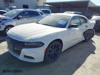 2023 Dodge Charger SXT with VIN 2C3CDXBG2PH532025, listed as a IAAI auction lot 41835764 with 9,815 mi miles. Bid and sale history available at carsss.com. Image 2.