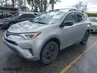 2017 Toyota RAV4 LE with VIN 2T3BFREV9HW659816, listed as a IAAI auction lot 41794815 with 197,751 mi miles. Bid and sale history available at carsss.com. Image 17.