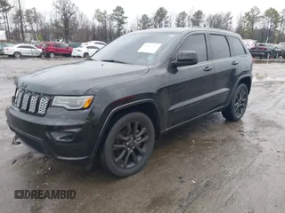2021 Jeep Grand Cherokee Laredo X with VIN 1C4RJEAG1MC680282, listed as a IAAI auction lot 41466496 with 58,855 mi miles and . Bid and sale history available at DreamBid. Image 2.
