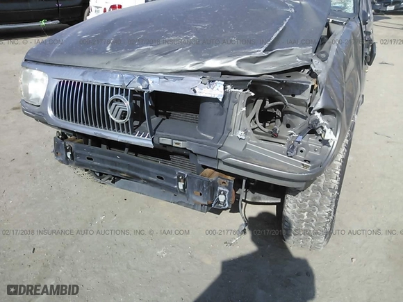 2000 Mercury Mountaineer with VIN 4M2ZU66E9YUJ34781, listed as a IAAI auction lot 21776040 with 128,003 mi miles. Bid and sale history available at carsss.com. Image 6.