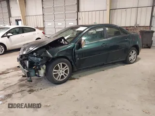 2006 Pontiac G6 6-Cyl z VIN 1G2ZG558664233613, wystawiony jako IAAI lot #41075907 z przebiegiem 228 361 mil mil oraz . Historia ofert i sprzedaży dostępna na DreamBid. Obrazek 17.