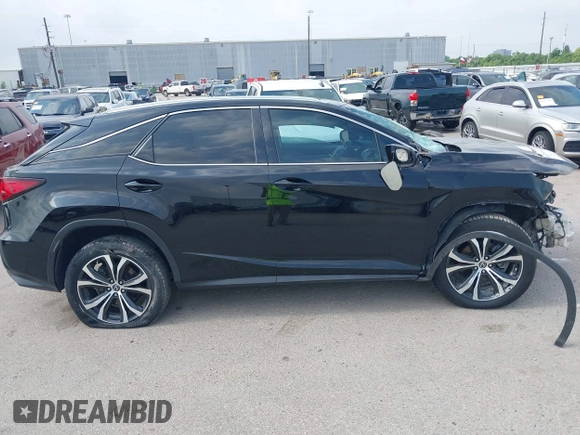 2018 Lexus RX 350 with VIN 2T2ZZMCA1JC103035, listed as a IAAI auction lot 42241695 with 104,382 mi miles and . Bid and sale history available at DreamBid. Image 14.