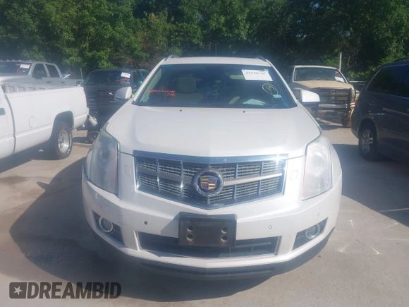 2011 Cadillac SRX Premium Collection z VIN 3GYFNCEYXBS579760, wystawiony jako IAAI lot #42238707 z przebiegiem Nie podano mil oraz . Historia ofert i sprzedaży dostępna na DreamBid. Obrazek 11.