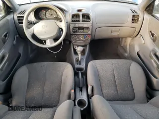 2000 Hyundai Accent z VIN KMHCG45GXYU125691, wystawiony jako Copart lot #87253294 z przebiegiem 91 062 mil mil oraz Szkoda całkowita • Salvage title. Historia ofert i sprzedaży dostępna na DreamBid. Obrazek 8.