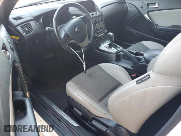 2014 Hyundai Genesis Coupe 2.0T z VIN KMHHT6KD0EU119806, wystawiony jako Copart lot #62371915 z przebiegiem 94 220 mil mil oraz Szkoda całkowita • Salvage title. Historia ofert i sprzedaży dostępna na DreamBid. Obrazek 8.
