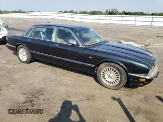 1996 Jaguar XJ with VIN SAJKX6747TC764559, listed as a Copart auction lot 48501775 with Not provided miles and Salvage title. Bid and sale history available at DreamBid. Image 4.