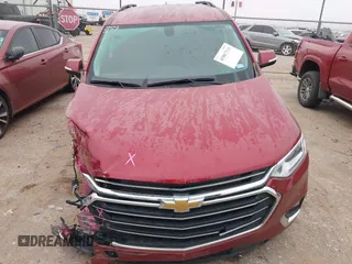2020 Chevrolet Traverse LT with VIN 1GNERHKW0LJ264997, listed as a IAAI auction lot 41867518 with 36,717 mi miles and . Bid and sale history available at DreamBid. Image 12.