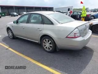 2008 Ford Taurus SEL with VIN 1FAHP24W88G178210, listed as a IAAI auction lot 41933552 with 142,971 mi miles. Bid and sale history available at carsss.com. Image 3.