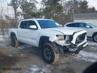 2023 Toyota Tacoma 4WD SR with VIN 3TMCZ5ANXPM599135, listed as a IAAI auction lot 41442577 with 26,901 mi miles. Bid and sale history available at carsss.com. Image 1.