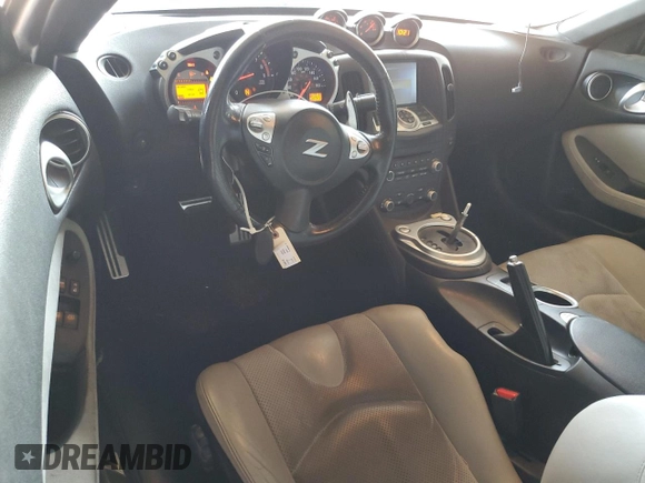 2012 Nissan 370Z Touring with VIN JN1AZ4EH9CM564312, listed as a Copart auction lot 52127525 with 134,465 mi miles and Salvage Title. Bid and sale history available at carsss.com. Image 8.