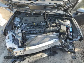 2025 Toyota Camry LE z VIN 4T1DAACK4SU588882, wystawiony jako Copart lot #52717395 z przebiegiem Nie podano mil oraz Szkoda całkowita • Salvage title. Historia ofert i sprzedaży dostępna na DreamBid. Obrazek 12.