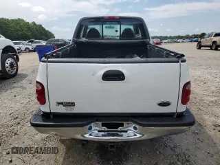 2001 Ford F-150 XL with VIN 1FTRX08L51KE49004, listed as a Copart auction lot 60470745 with 199,490 mi miles and Salvage title. Bid and sale history available at DreamBid. Image 6.