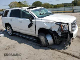 2019 GMC Yukon Denali with VIN 1GKS1CKJ7KR194428, listed as a Copart auction lot 71191064 with 56,409 mi miles and Salvage Title. Bid and sale history available at carsss.com. Image 4.