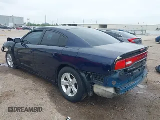 2013 Dodge Charger SE with VIN 2C3CDXBG9DH711044, listed as a IAAI auction lot 41915565 with 156,248 mi miles. Bid and sale history available at carsss.com. Image 3.