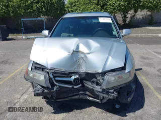 2004 Acura TSX w/Navigation z VIN JH4CL96934C023631, wystawiony jako IAAI lot #41993059 z przebiegiem 165 449 mil mil oraz . Historia ofert i sprzedaży dostępna na DreamBid. Obrazek 12.