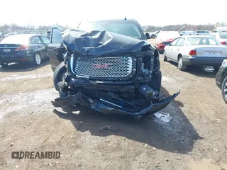 2017 GMC Yukon Denali with VIN 1GKS2CKJ0HR185365, listed as a IAAI auction lot 41856187 with 107,641 mi miles. Bid and sale history available at carsss.com. Image 6.