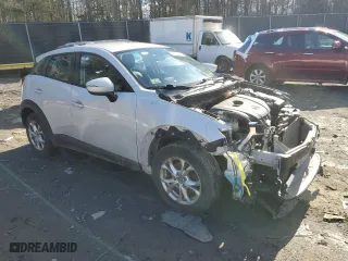 2016 Mazda CX-3 Touring with VIN JM1DKFC78G0140606, listed as a Copart auction lot 46979195 with 126,656 mi miles and Salvage Title. Bid and sale history available at carsss.com. Image 4.