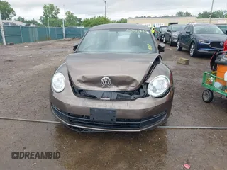 2012 Volkswagen Beetle 2.5L PZEV with VIN 3VWJP7AT2CM638265, listed as a IAAI auction lot 42512449 with 137,129 mi miles and . Bid and sale history available at DreamBid. Image 6.