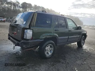 1996 Jeep Grand Cherokee with VIN 1J4EZ58S9TC148692, listed as a Copart auction lot 87730075 with Not provided miles and Salvage title. Bid and sale history available at DreamBid. Image 3.