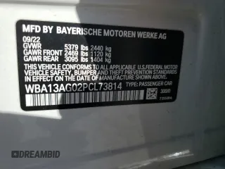 2023 BMW 5 Series 530e with VIN WBA13AG02PCL73814, listed as a Copart auction lot 86818824 with Not provided miles and Salvage title. Bid and sale history available at DreamBid. Image 14.