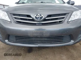 2013 Toyota Corolla L with VIN 2T1BU4EE7DC102626, listed as a IAAI auction lot 42087600 with 84,977 mi miles. Bid and sale history available at carsss.com. Image 6.