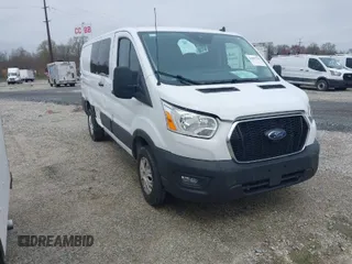 2021 Ford Transit Cargo with VIN 1FTBR1Y82MKA44171, listed as a IAAI auction lot 41857534 with 26,295 mi miles. Bid and sale history available at carsss.com. Image 1.