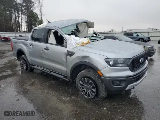 2023 Ford Ranger XL with VIN 1FTER4FH3PLE14401, listed as a Copart auction lot 41427785 with 18,492 mi miles and Salvage Title. Bid and sale history available at carsss.com. Image 4.