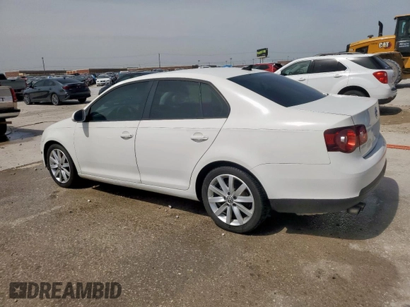 2010 Volkswagen Jetta Wolfsburg Edition with VIN 3VWRA7AJ0AM156555, listed as a Copart auction lot 56982155 with 72,054 mi miles and Salvage title. Bid and sale history available at DreamBid. Image 2.