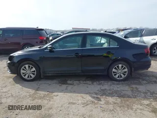 2016 Volkswagen Jetta Sedan 1.4T SE with VIN 3VWD67AJ3GM390273, listed as a IAAI auction lot 41575074 with 114,705 mi miles. Bid and sale history available at carsss.com. Image 15.