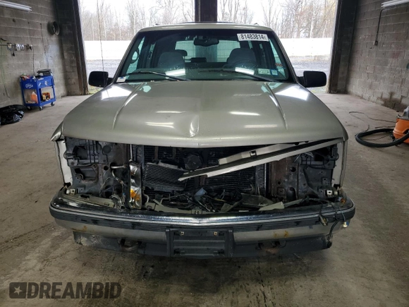 1998 GMC Yukon with VIN 1GKEC13R9WJ715363, listed as a Copart auction lot 81483814 with 186,437 mi miles and Salvage Title. Bid and sale history available at carsss.com. Image 5.