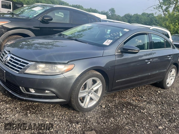 2013 Volkswagen CC R-Line with VIN WVWBP7AN1DE571321, listed as a Copart auction lot 70648784 with 122,061 mi miles and Clean Title. Bid and sale history available at carsss.com. Image 1.