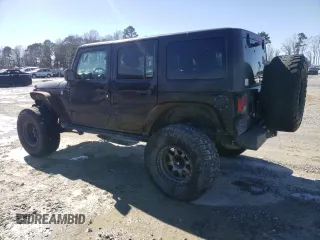 2016 Jeep Wrangler Unlimited Rubicon Hard Rock with VIN 1C4BJWFG9GL209484, listed as a Copart auction lot 87815475 with 85,729 mi miles and Salvage Title. Bid and sale history available at carsss.com. Image 2.