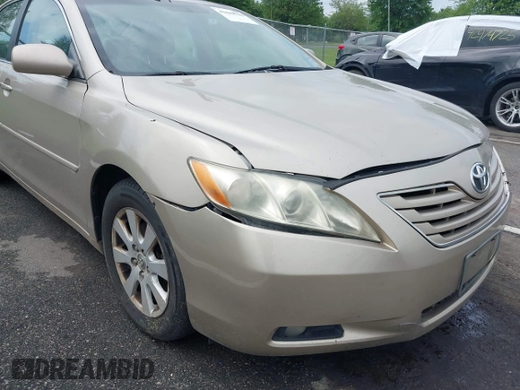 2009 Toyota Camry LE z VIN 4T1BK46KX9U089242, wystawiony jako IAAI lot #42448998 z przebiegiem 252 787 mil mil oraz . Historia ofert i sprzedaży dostępna na DreamBid. Obrazek 14.