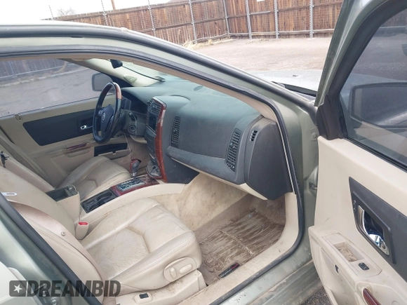2004 Cadillac SRX with VIN 1GYDE63A340128713, listed as a IAAI auction lot 41788552 with 158,606 mi miles. Bid and sale history available at carsss.com. Image 5.
