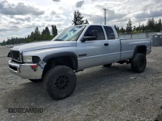 2001 Dodge 2500 with VIN 3B7KF23651G730843, listed as a Copart auction lot 57876425 with 218,471 mi miles and Salvage title. Bid and sale history available at DreamBid. Image 1.