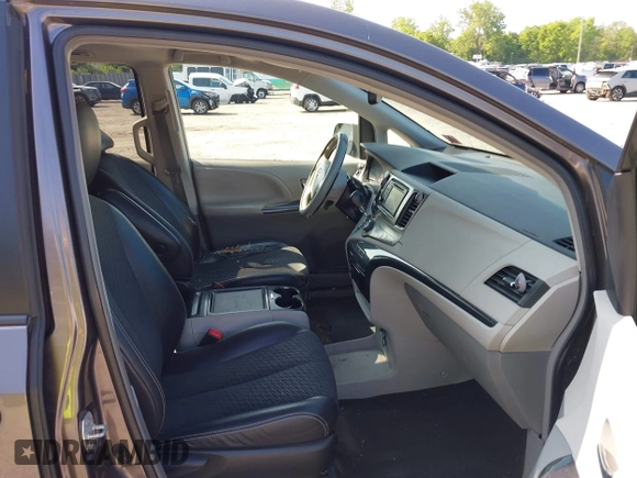 2012 Toyota Sienna SE with VIN 5TDXK3DCXCS267405, listed as a IAAI auction lot 42401101 with 134,553 mi miles and . Bid and sale history available at DreamBid. Image 5.