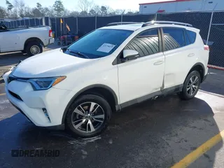 2018 Toyota RAV4 XLE with VIN JTMWFREV7JJ743297, listed as a IAAI auction lot 41579019 with 102,442 mi miles. Bid and sale history available at carsss.com. Image 2.