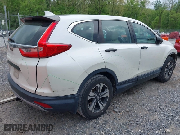2018 Honda CR-V LX with VIN 2HKRW5H36JH409111, listed as a IAAI auction lot 42133939 with 105,511 mi miles and . Bid and sale history available at DreamBid. Image 4.