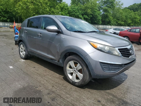 2012 Kia Sportage LX z VIN KNDPBCA24C7263100, wystawiony jako Copart lot #59538495 z przebiegiem 212 750 mil mil oraz Szkoda całkowita • Salvage title. Historia ofert i sprzedaży dostępna na DreamBid. Obrazek 4.
