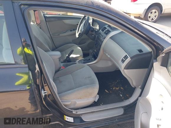 2012 Toyota Corolla L with VIN 5YFBU4EE5CP069365, listed as a IAAI auction lot 41852689 with 220,730 mi miles. Bid and sale history available at carsss.com. Image 5.
