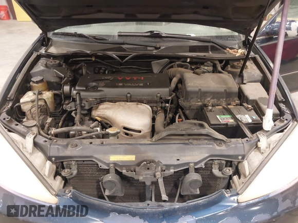 2003 Toyota Camry LE with VIN 4T1BE30K03U152348, listed as a IAAI auction lot 42082892 with 224,721 mi miles and . Bid and sale history available at DreamBid. Image 10.