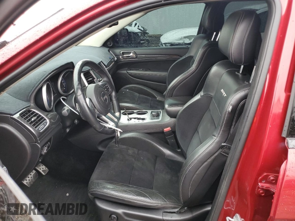 2012 Jeep Grand Cherokee SRT8 with VIN 1C4RJFDJ0CC351195, listed as a Copart auction lot 72794454 with 104,672 mi miles and Salvage Title. Bid and sale history available at carsss.com. Image 7.