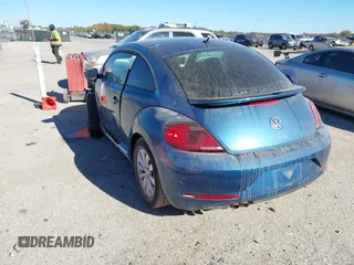 2019 Volkswagen Beetle S with VIN 3VWFD7AT7KM719095, listed as a IAAI auction lot 40919031 with 86,516 mi miles. Bid and sale history available at carsss.com. Image 3.