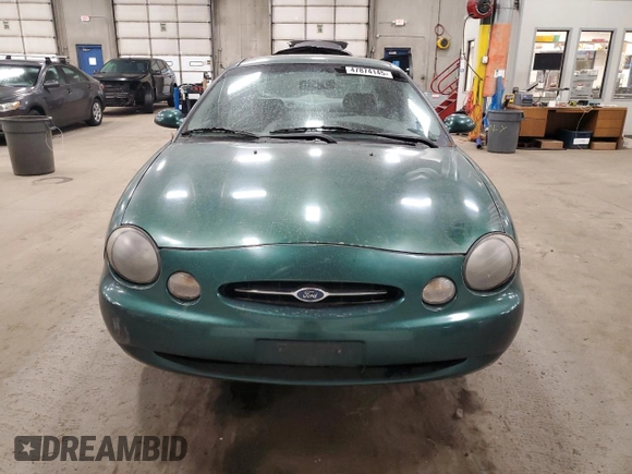 1999 Ford Taurus SE z VIN 1FAFP53U8XA296719, wystawiony jako Copart lot #47874145 z przebiegiem 84 093 mil mil oraz Czysty tytuł • Clean title. Historia ofert i sprzedaży dostępna na DreamBid. Obrazek 5.