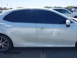 2023 Toyota Camry XLE z VIN 4T1F11AKXPU758648, wystawiony jako IAAI lot #42471815 z przebiegiem 27 714 mil mil oraz . Historia ofert i sprzedaży dostępna na DreamBid. Obrazek 13.